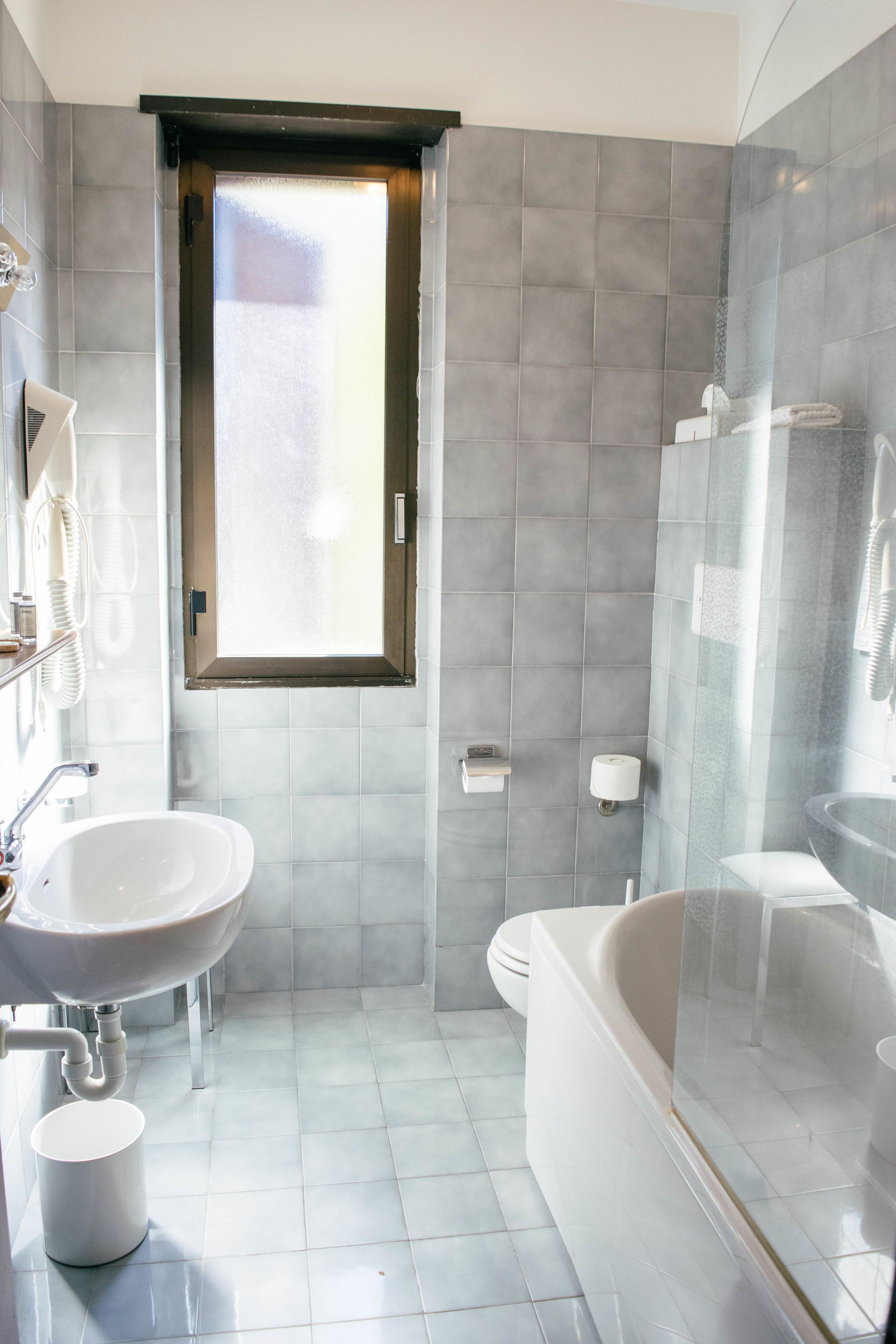 double room single use | bathroom | shower, hair dryer, bidet, towels