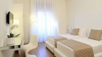Habitación con 1 cama matrimonial o 2 individuales | Sábanas italianas Frette, ropa de cama de alta calidad y minibar