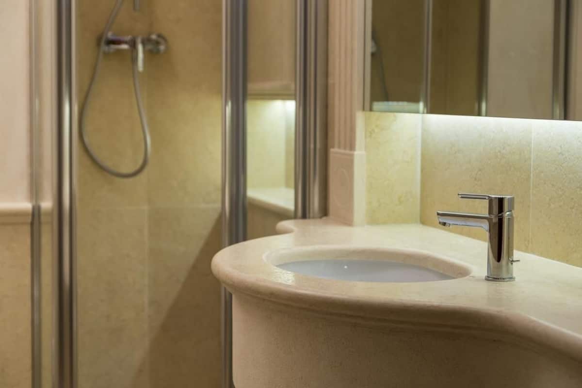 superior double room, 1 queen bed | bathroom | shower, rainfall showerhead, hair dryer, slippers