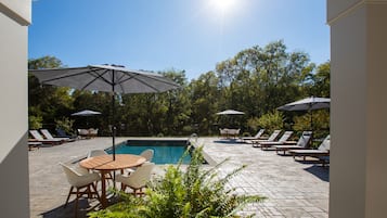 Outdoor pool, pool umbrellas, pool loungers