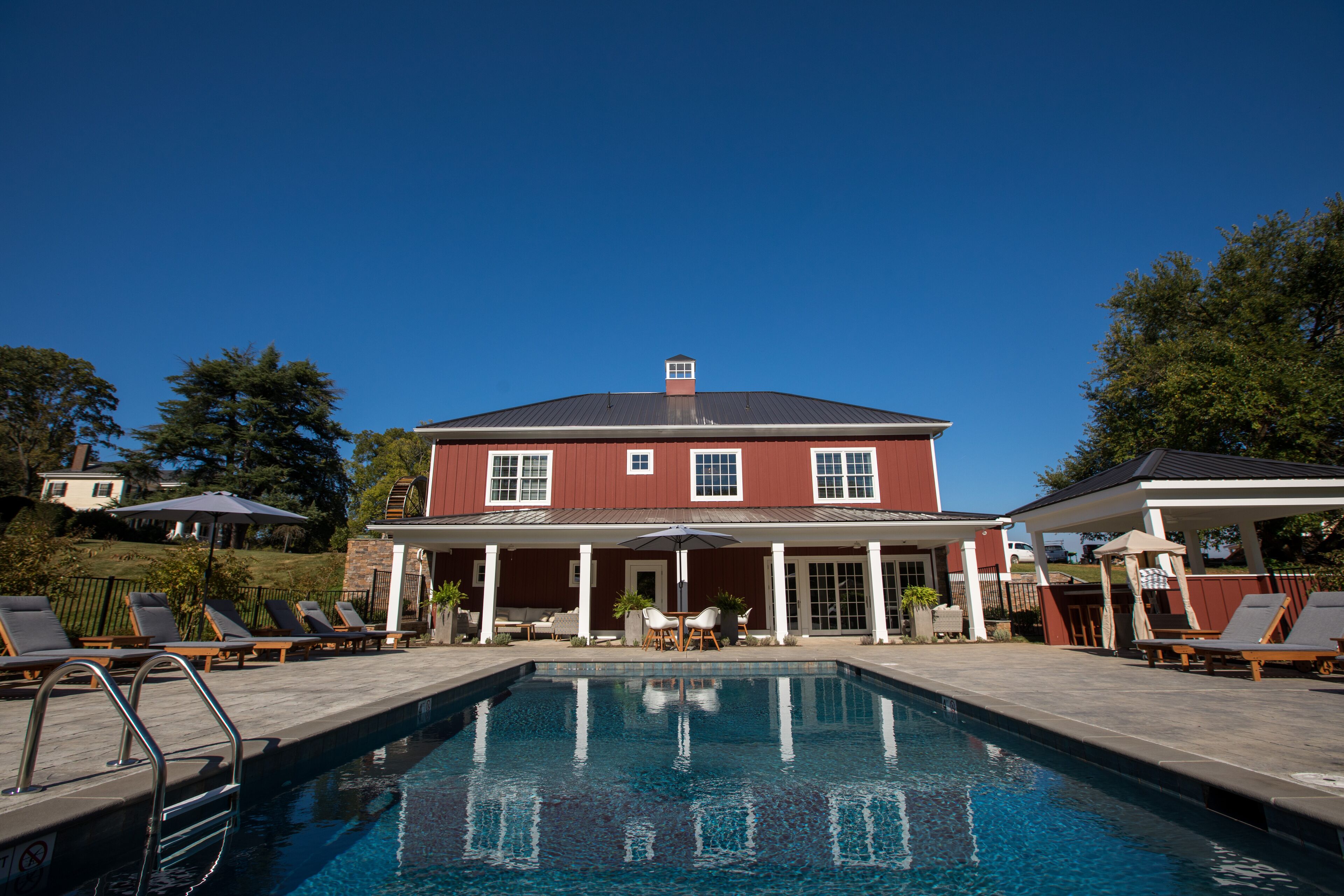 outdoor pool, pool umbrellas, pool loungers