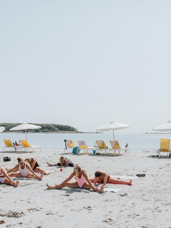 On the beach, beach yoga, surfing, kayaking