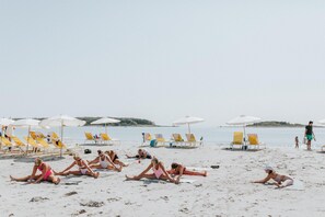 On the beach, beach yoga, surfing, kayaking