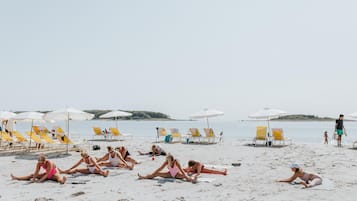 On the beach, beach yoga, surfing, kayaking