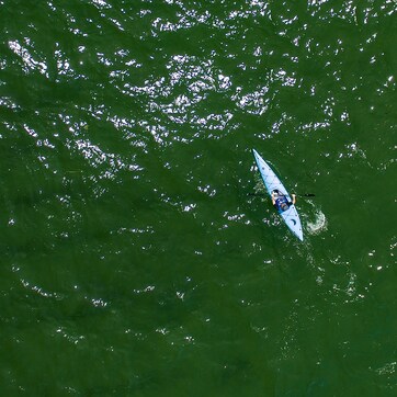 A kayaker on a river.