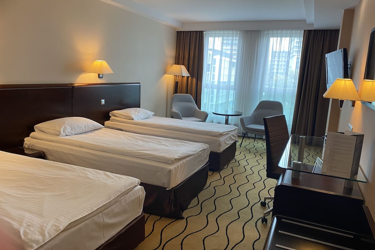 comfort triple room | premium bedding, select comfort beds, in-room safe, desk