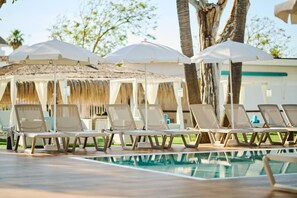 Seasonal outdoor pool, pool umbrellas, sun loungers