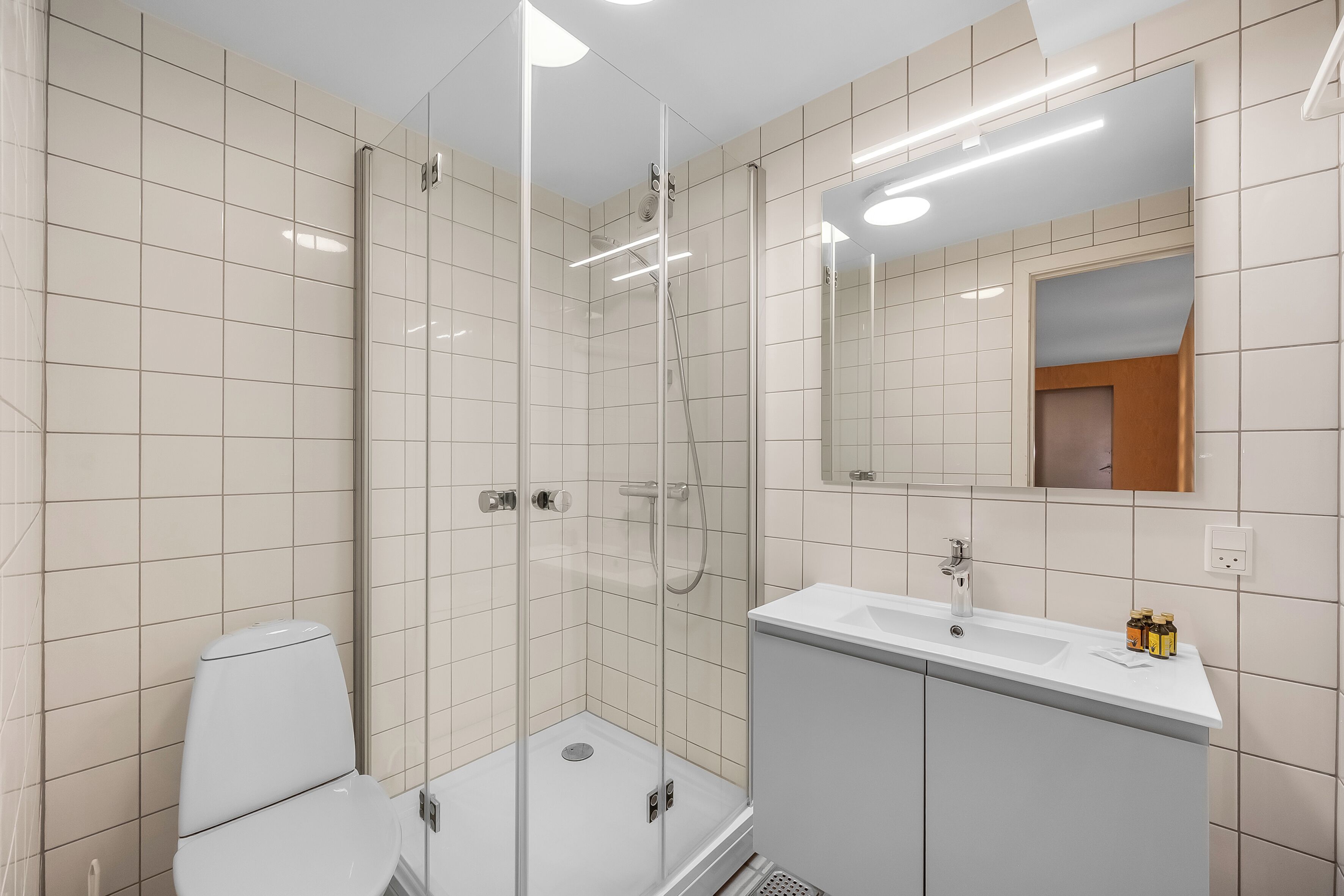 studio | bathroom | shower, towels, soap, shampoo