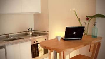 Fridge, microwave, cookware/dishes/utensils