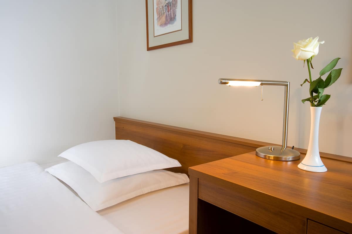 Pillow-top beds, desk, free WiFi, bed sheets