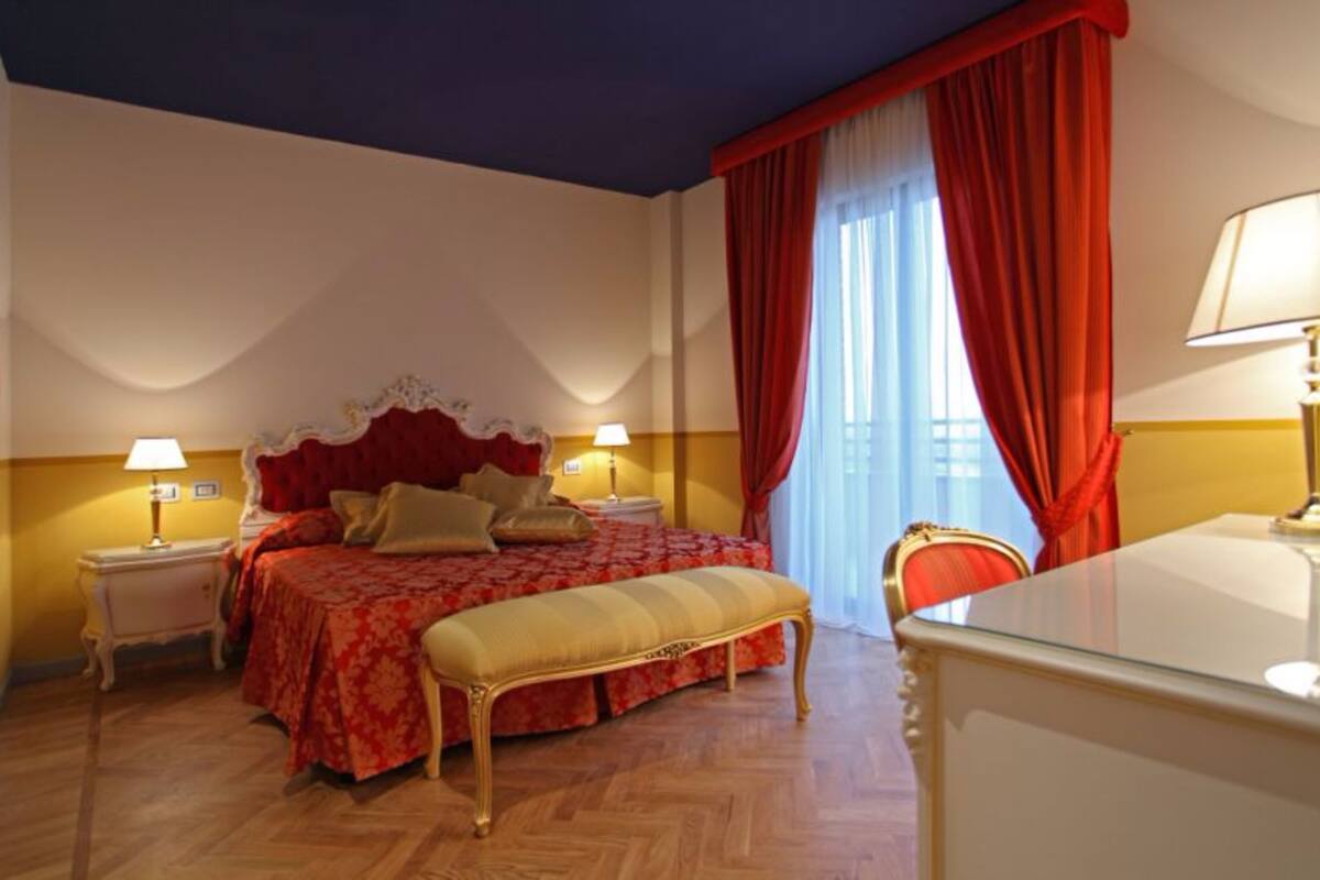 deluxe double or twin room, pool access | minibar, in-room safe, desk, blackout curtains