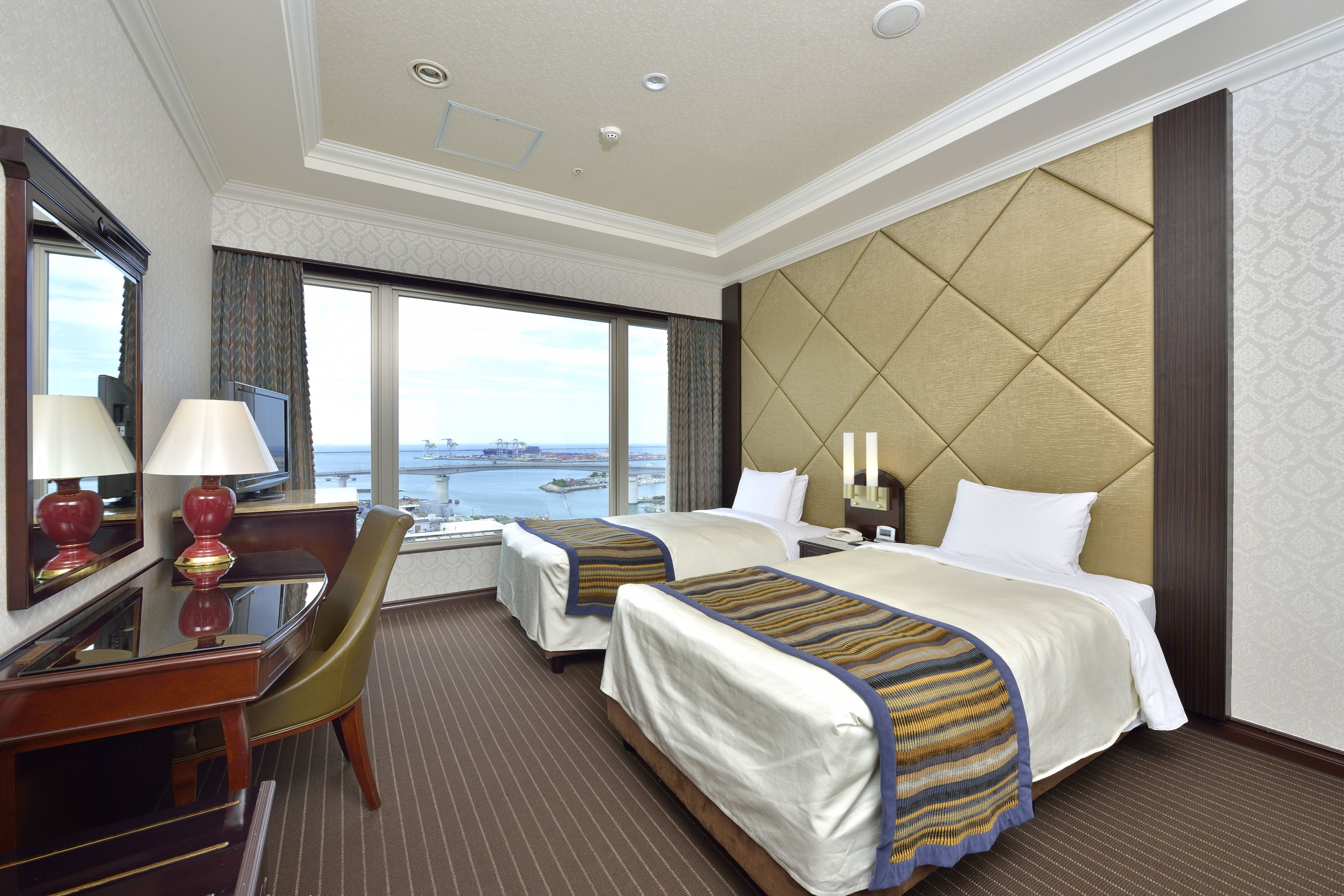 deluxe twin room | in-room safe, desk, blackout curtains, iron/ironing board