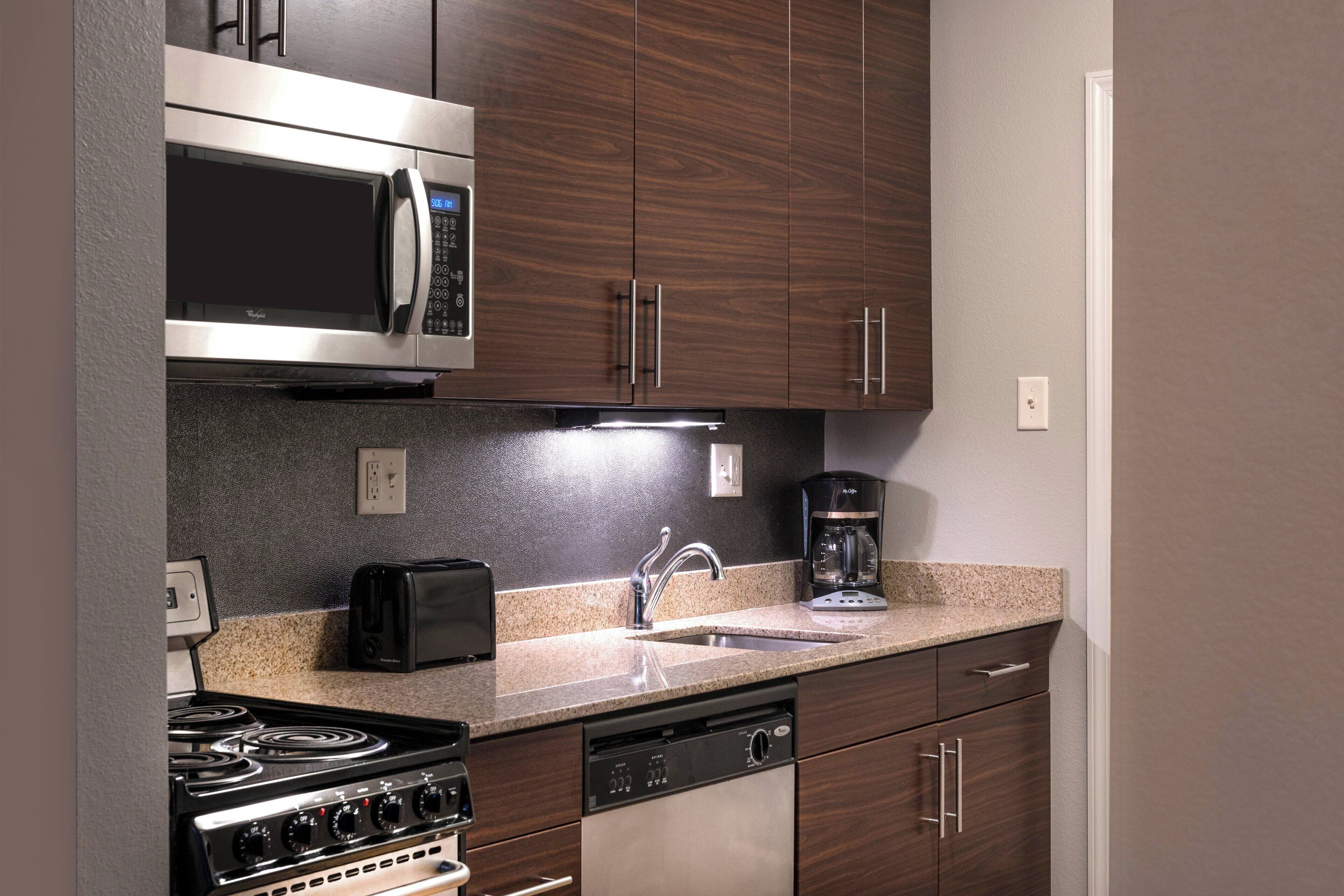 suite, 1 bedroom | private kitchen | full-sized fridge, microwave, stovetop, dishwasher