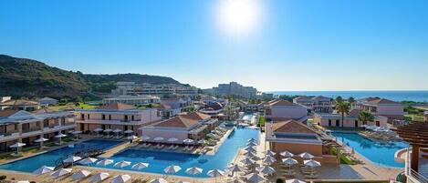 Indoor pool, seasonal outdoor pool, pool umbrellas, pool loungers