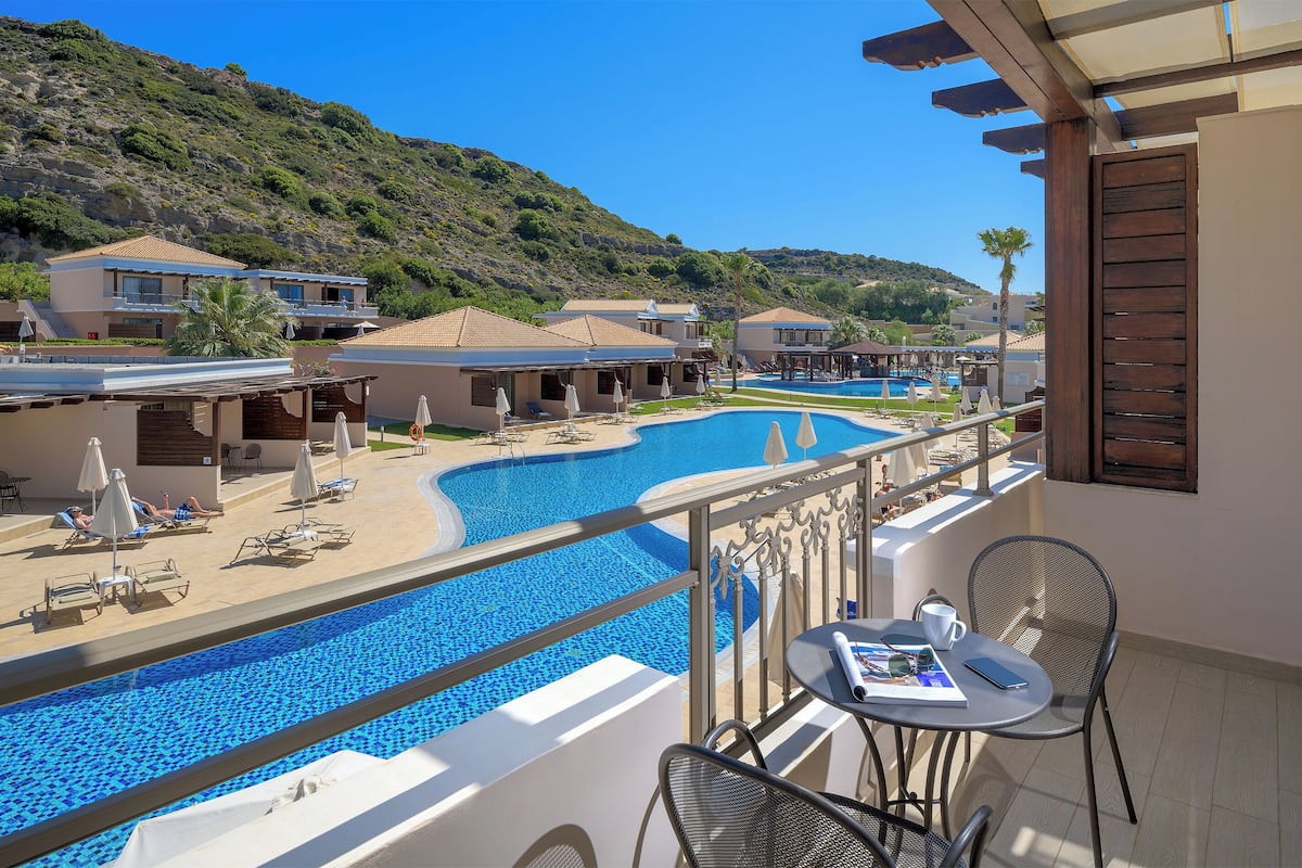 junior suite, pool view (adults only) | 2 bedrooms, hypo-allergenic bedding, minibar, in-room safe