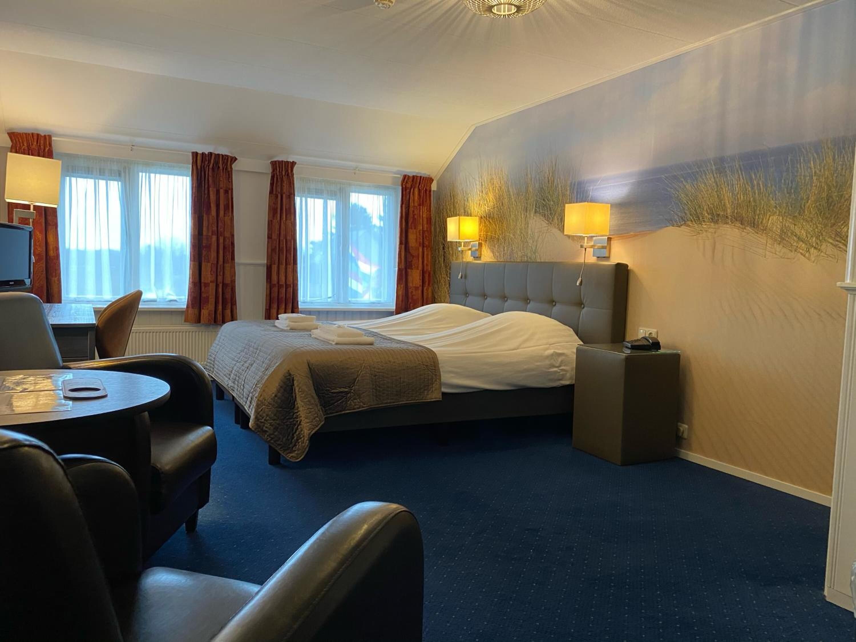 hypo-allergenic bedding, select comfort beds, in-room safe, desk