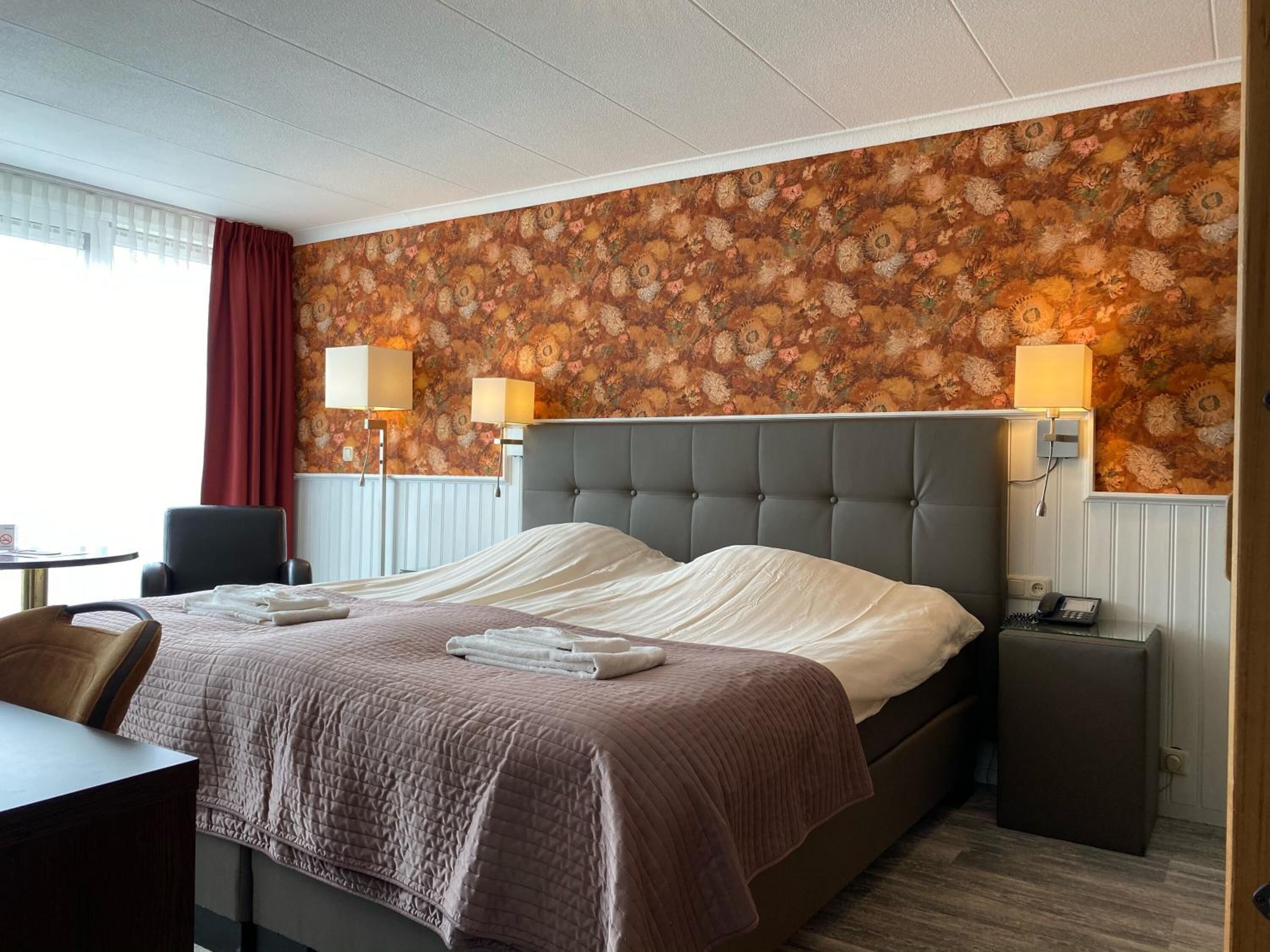 hypo-allergenic bedding, select comfort beds, in-room safe, desk