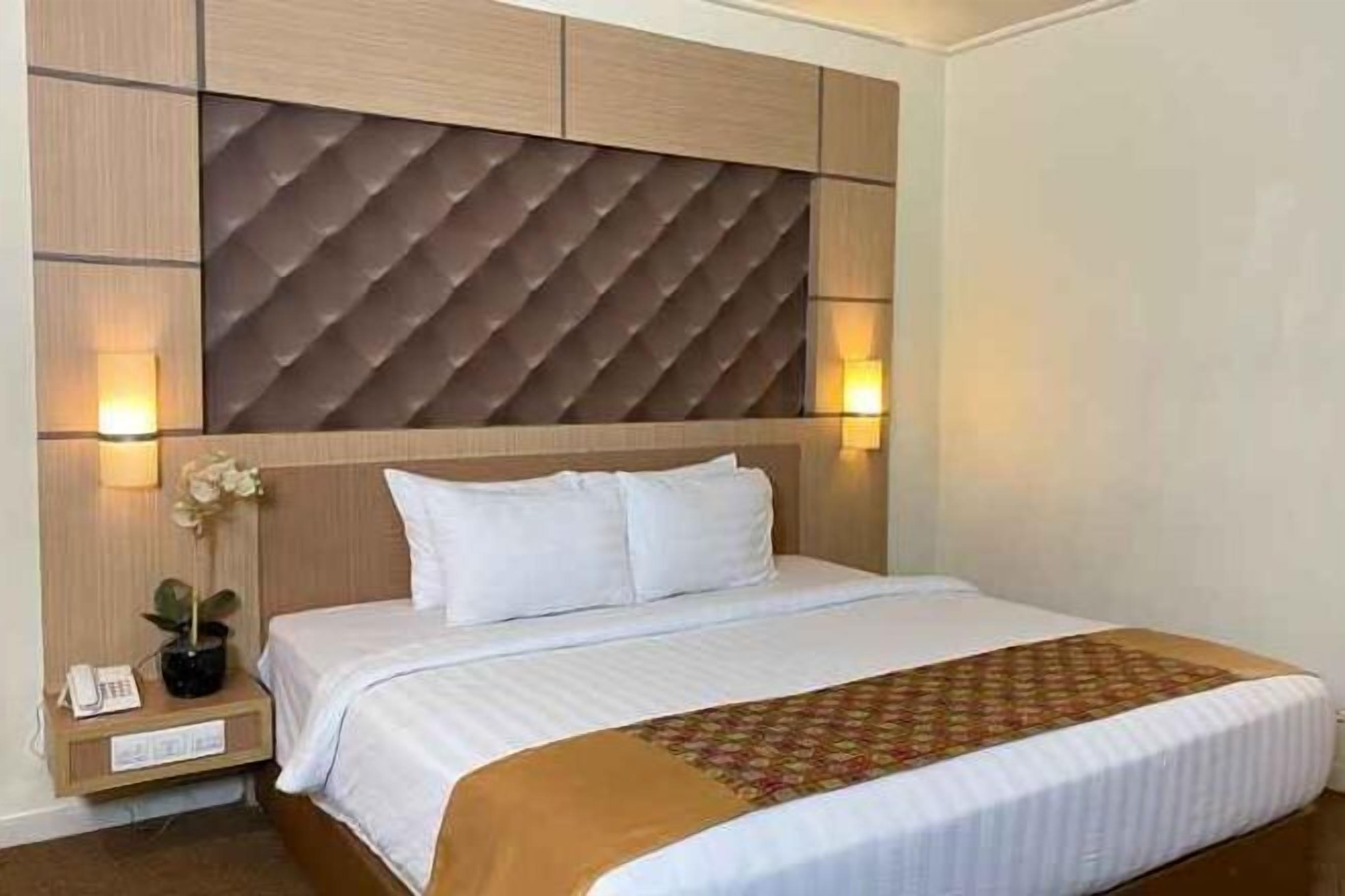 Meja kerja, tempat tidur lipat/tambahan, dan Wi-Fi gratis