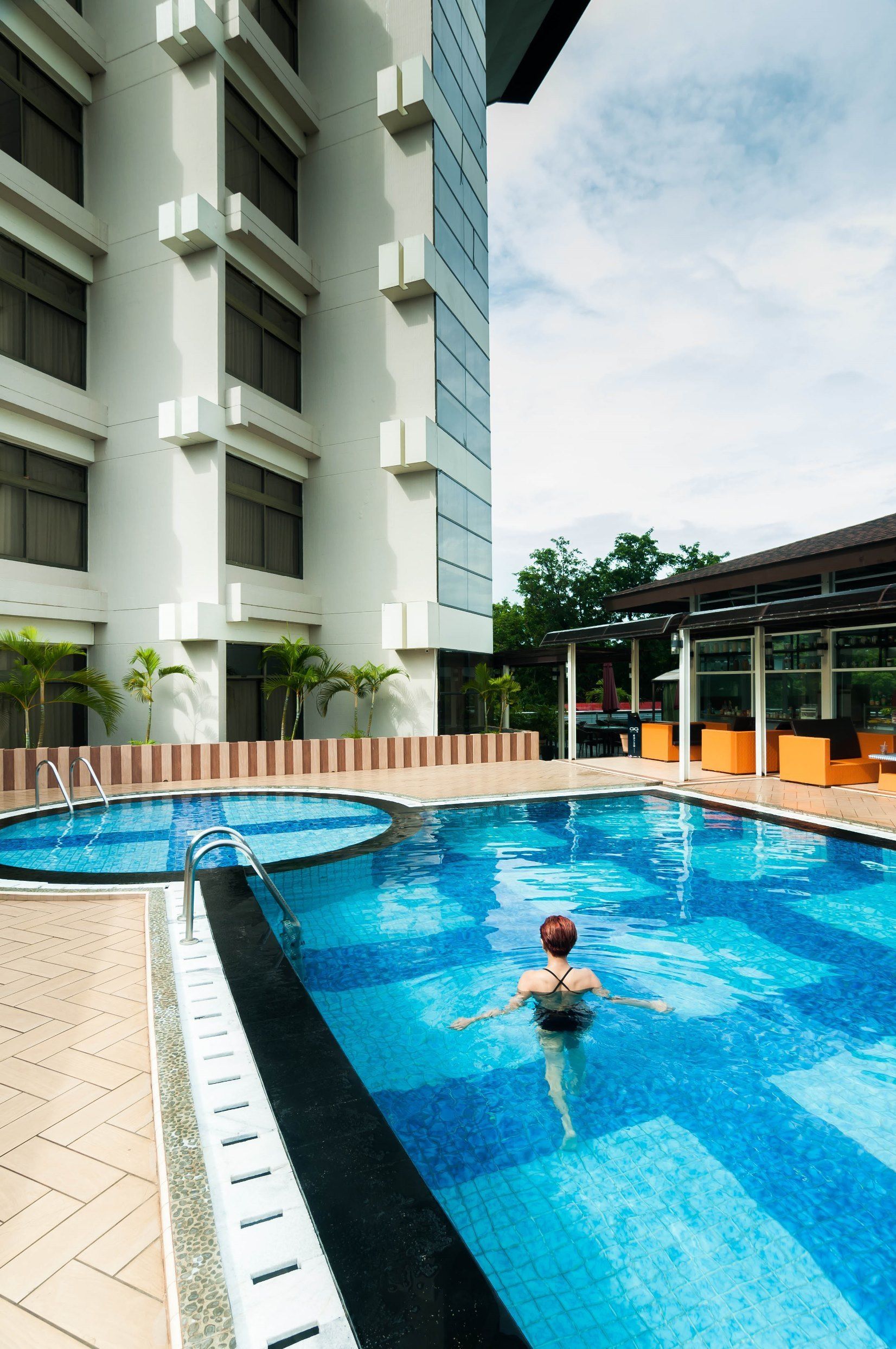 Outdoor pool, pool umbrellas, sun loungers