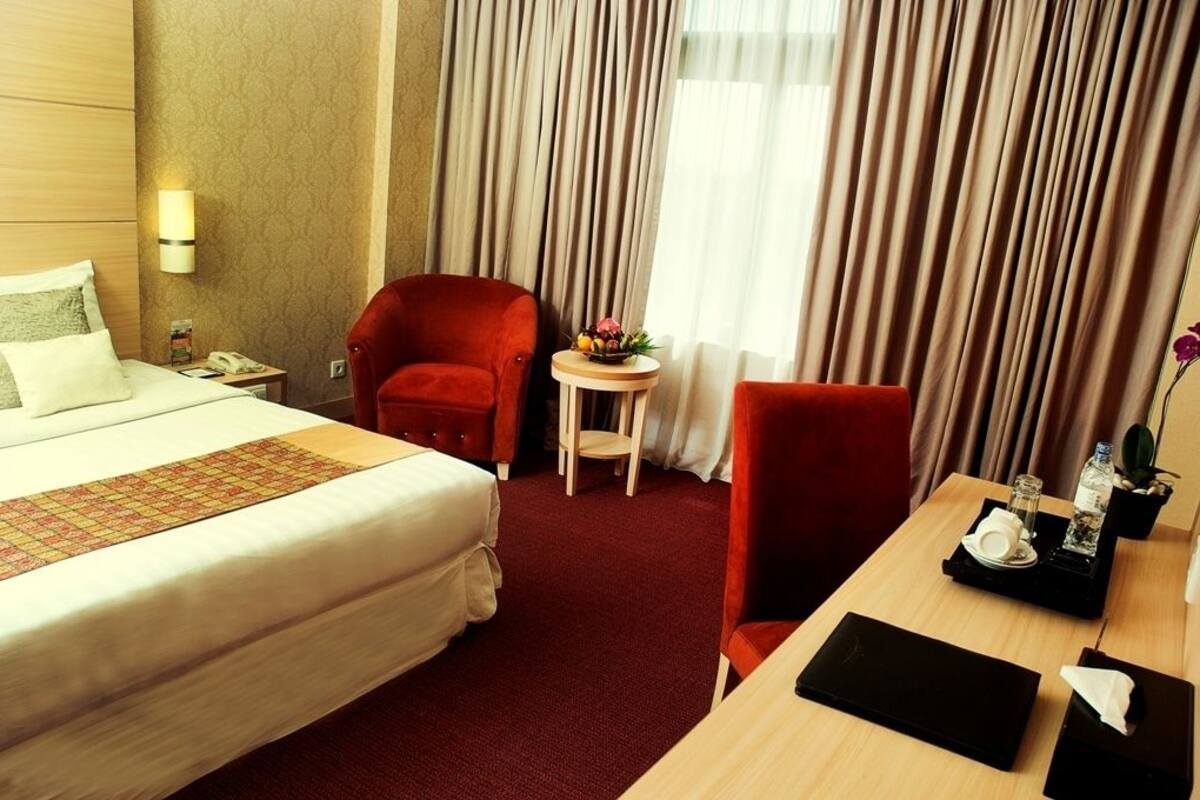 Habitación Deluxe | Escritorio, camas supletorias, wifi gratis