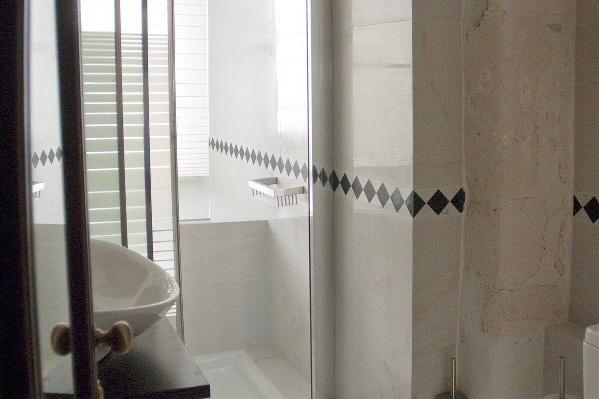 junior suite, balcony | bathroom | designer toiletries, hair dryer, bathrobes, slippers