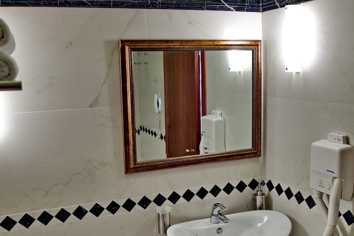 junior suite, balcony | bathroom | designer toiletries, hair dryer, bathrobes, slippers