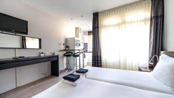 Studio, Balcony | Down duvets, minibar, in-room safe, desk