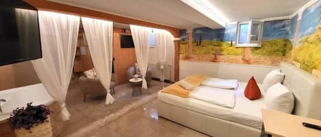 Habitación romántica (Sauna for a fee) | Escritorio, wifi gratis y ropa de cama