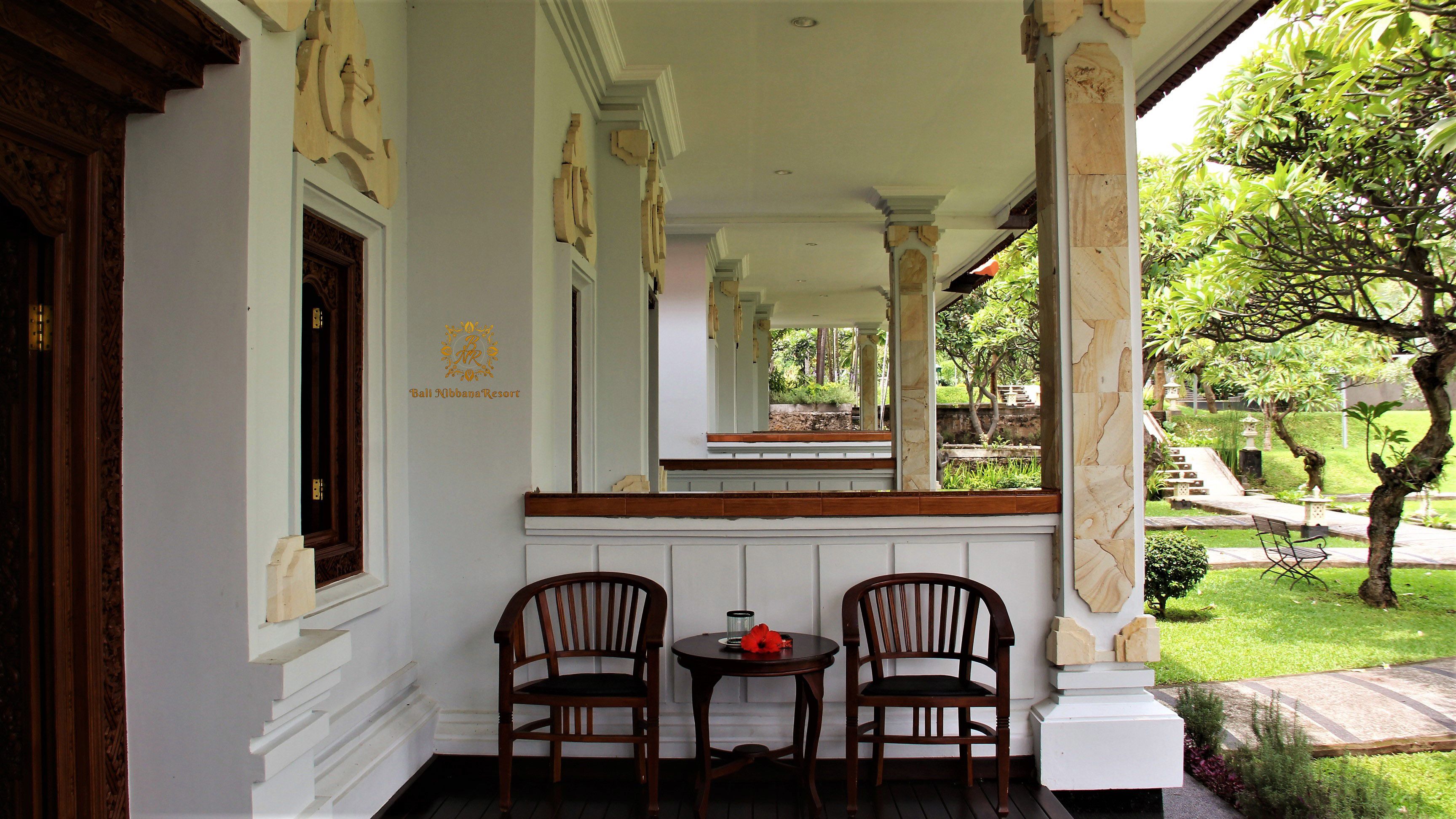 deluxe room, garden view | terrace/patio