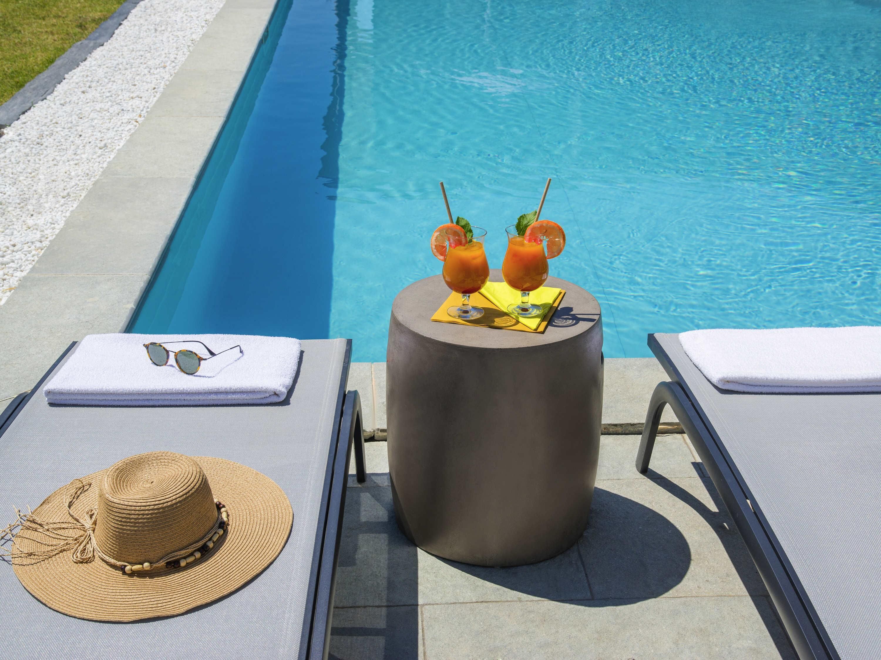 Outdoor pool, open 7:30 AM to 9:30 PM, sun loungers