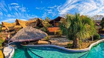 Outdoor pool, open 7:00 AM to 10:00 PM, sun loungers