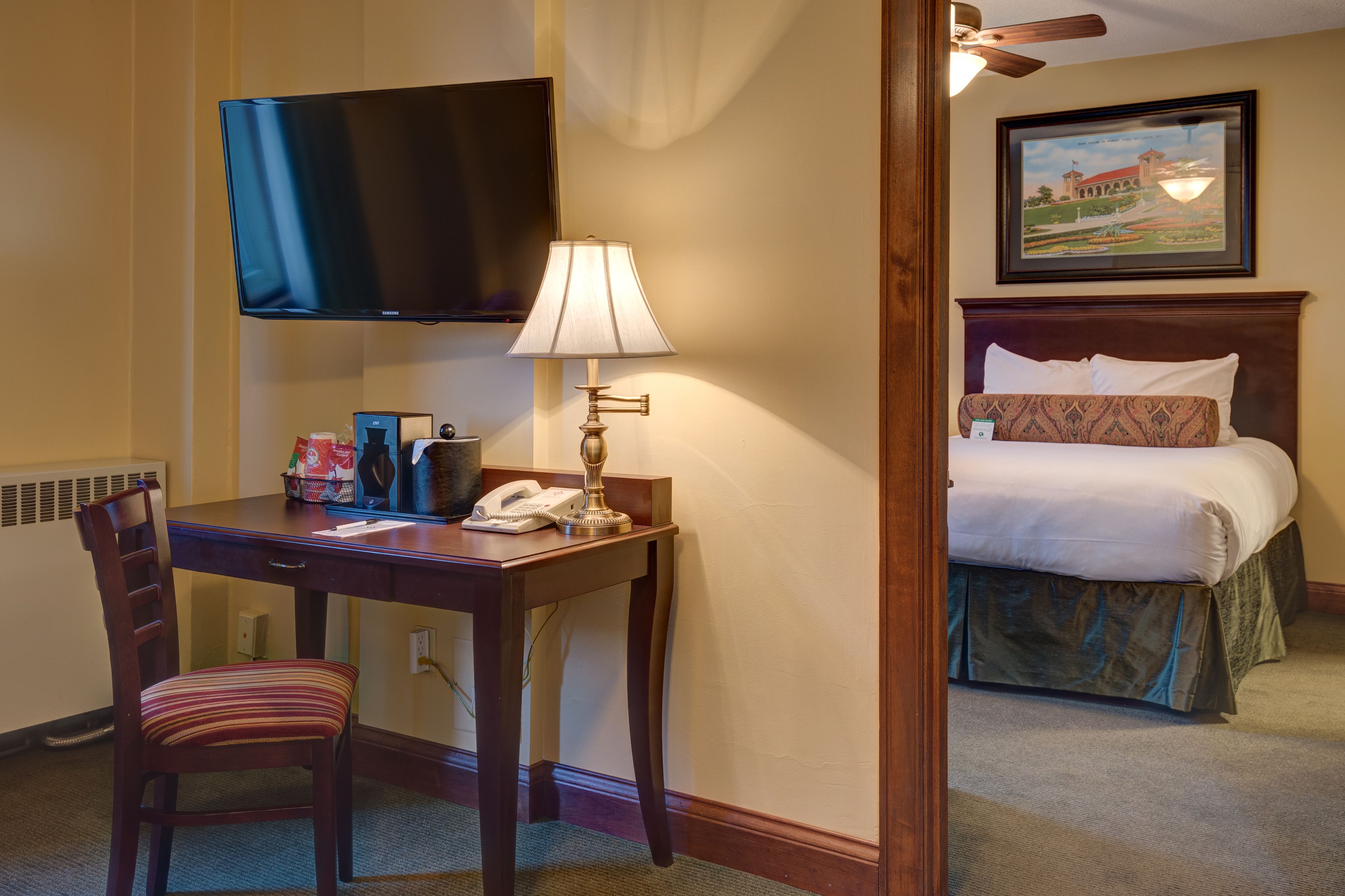 deluxe room, 1 queen bed with sofa bed, non smoking | premium bedding, desk, iron/ironing board, free cots/infant beds