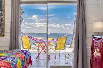 Deluxe Double Room, 2 Double Beds, Bay View | Premium bedding, pillowtop beds, individually decorated at Ibis Bay Beach Resort