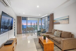 2 Bedroom Corner Ocean View Apartment | Living area | TV, DVD player