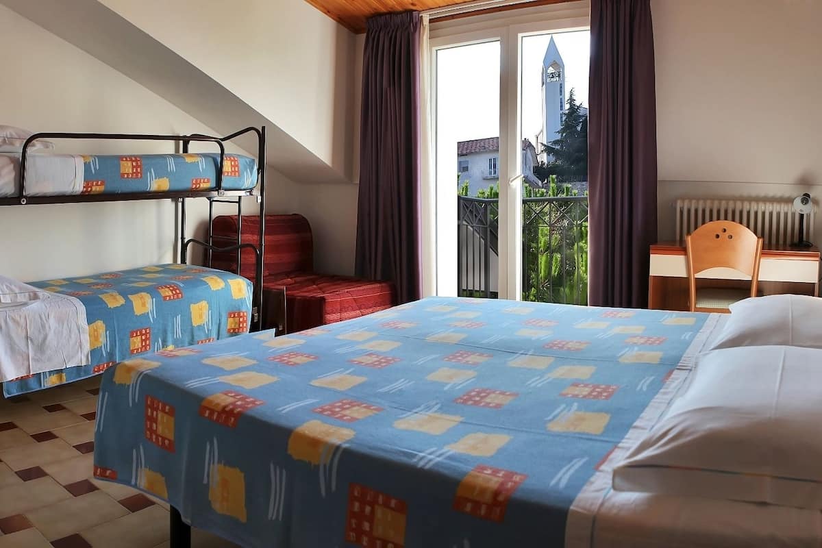 quadruple room, hill view | in-room safe, desk, soundproofing, free cots/infant beds