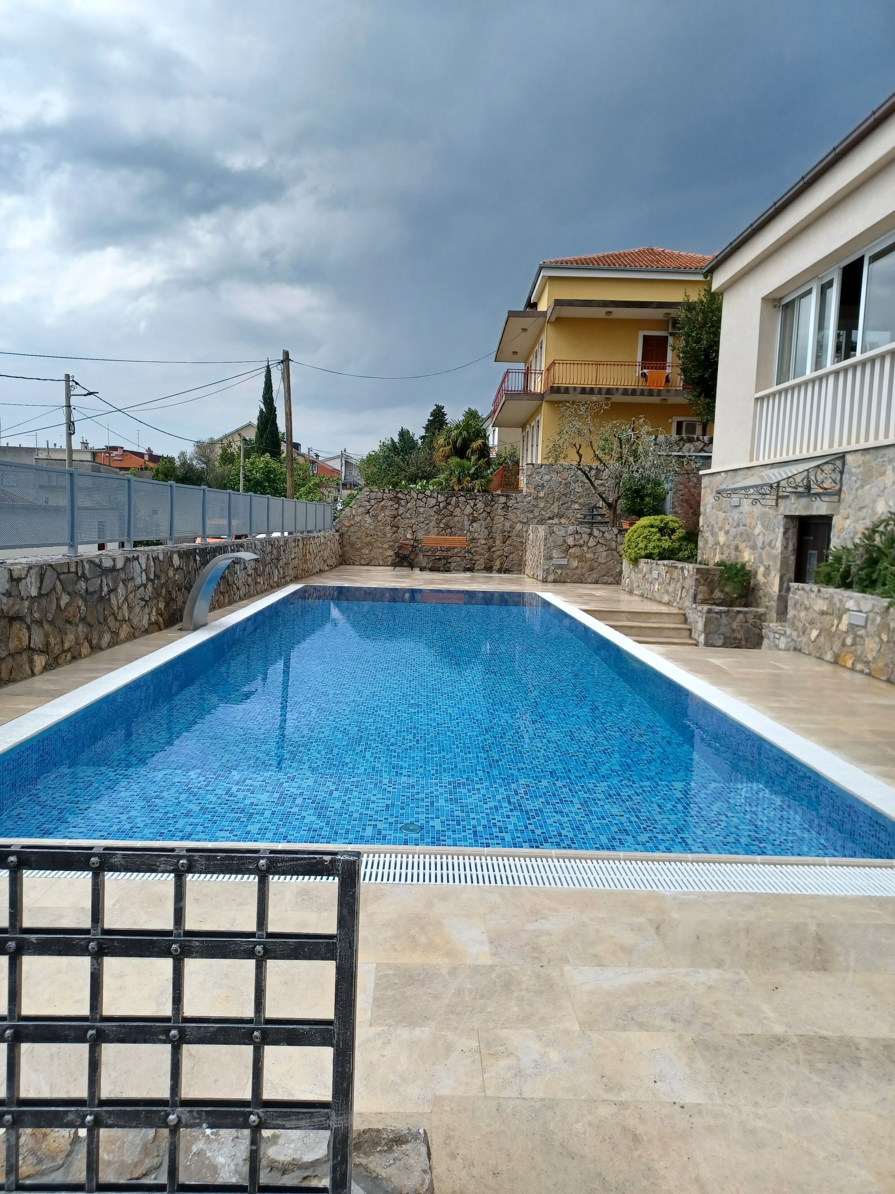 seasonal outdoor pool, open 8:00 am to 10:00 am, pool umbrellas