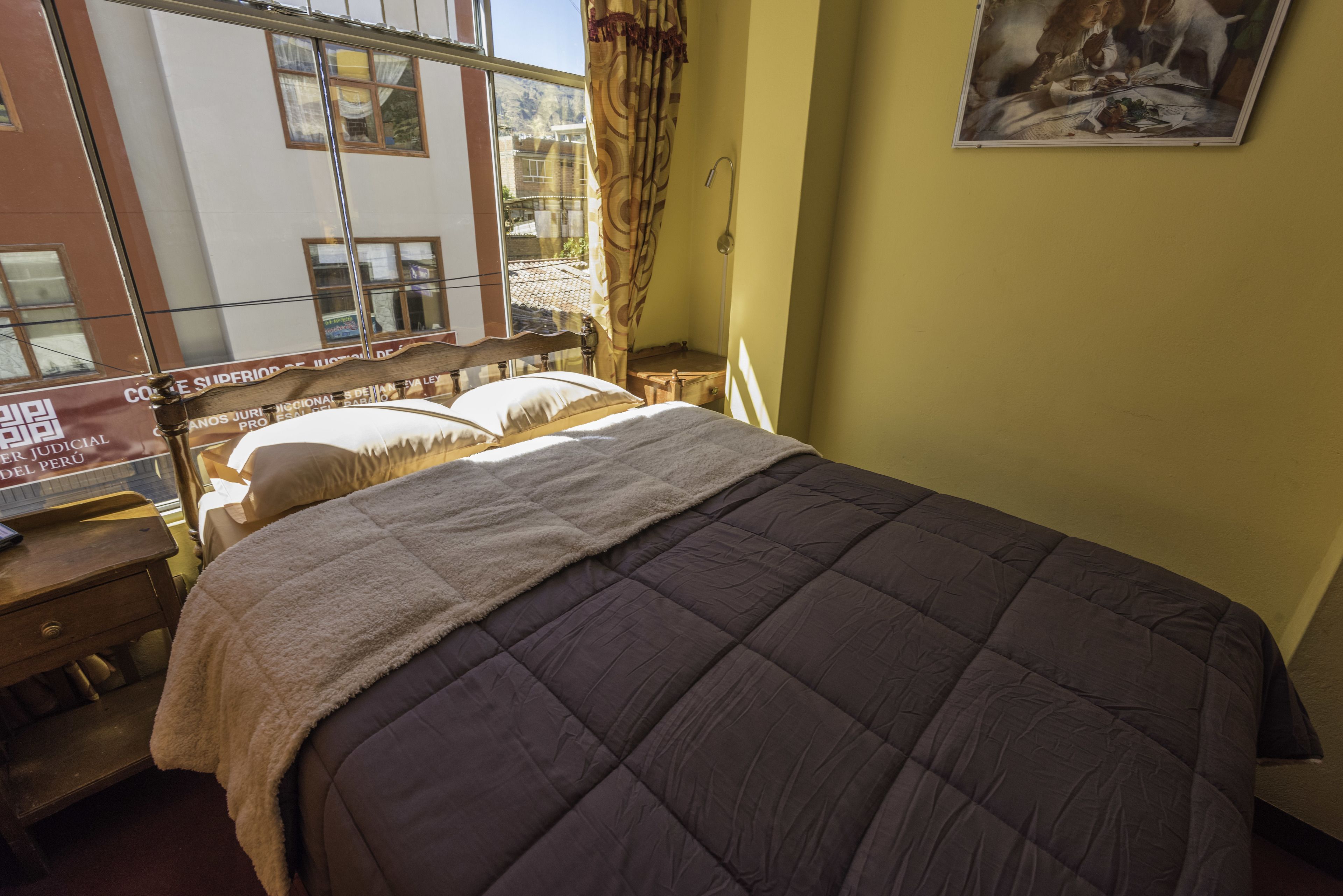 Basic Double Room, 1 Bedroom, City View | Down comforters, in-room safe, individually decorated, free WiFi