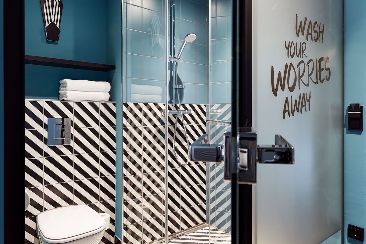 légère room | bathroom | shower, rainfall showerhead, eco-friendly toiletries, hair dryer