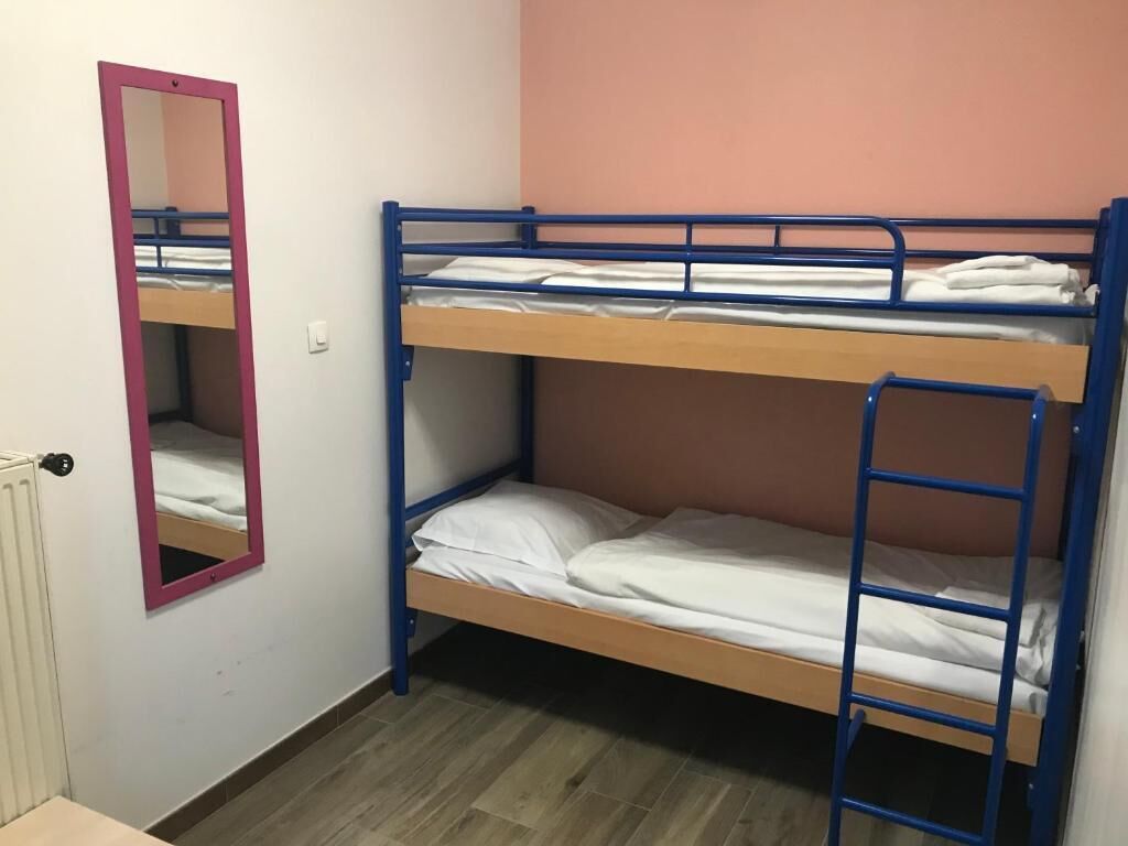 family room | desk, soundproofing, iron/ironing board, rollaway beds