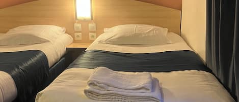 Desk, soundproofing, iron/ironing board, rollaway beds