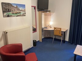 Desk, soundproofing, iron/ironing board, rollaway beds