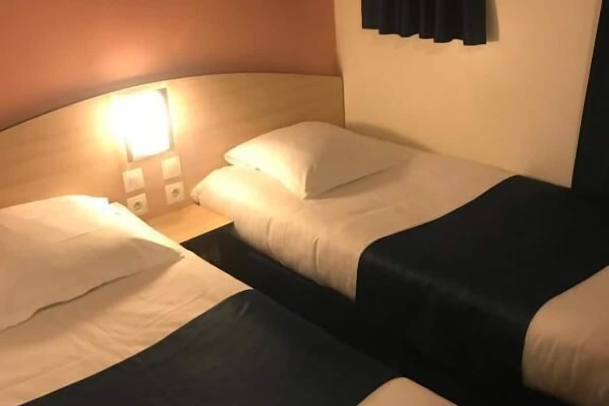 Desk, soundproofing, iron/ironing board, rollaway beds