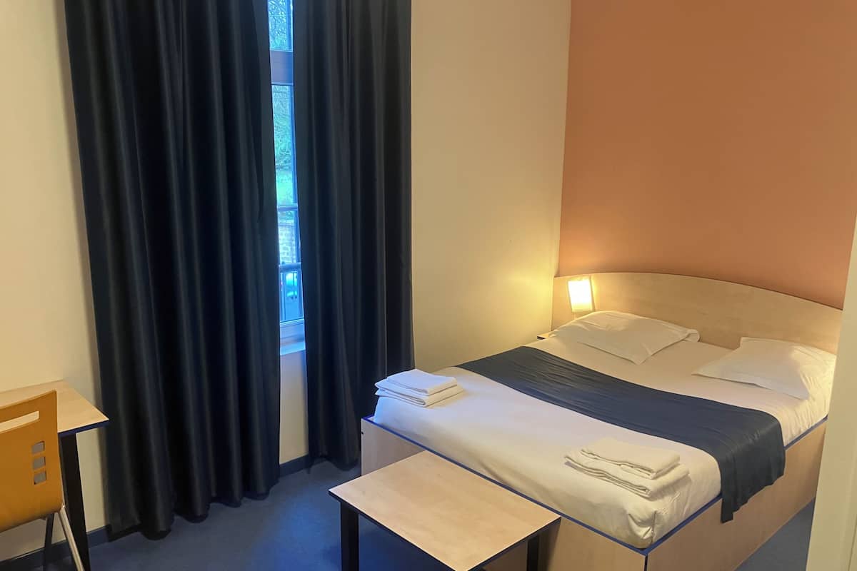 Desk, soundproofing, iron/ironing board, rollaway beds