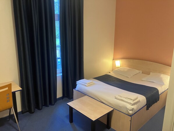 Desk, soundproofing, iron/ironing board, rollaway beds