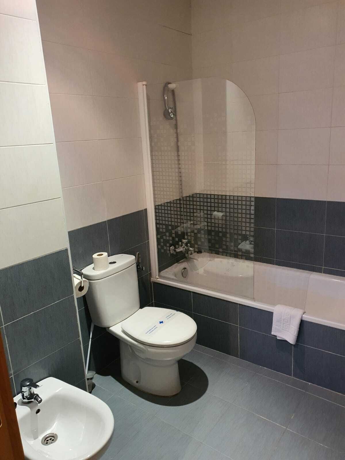 twin room | bathroom | shower, hair dryer, towels, soap