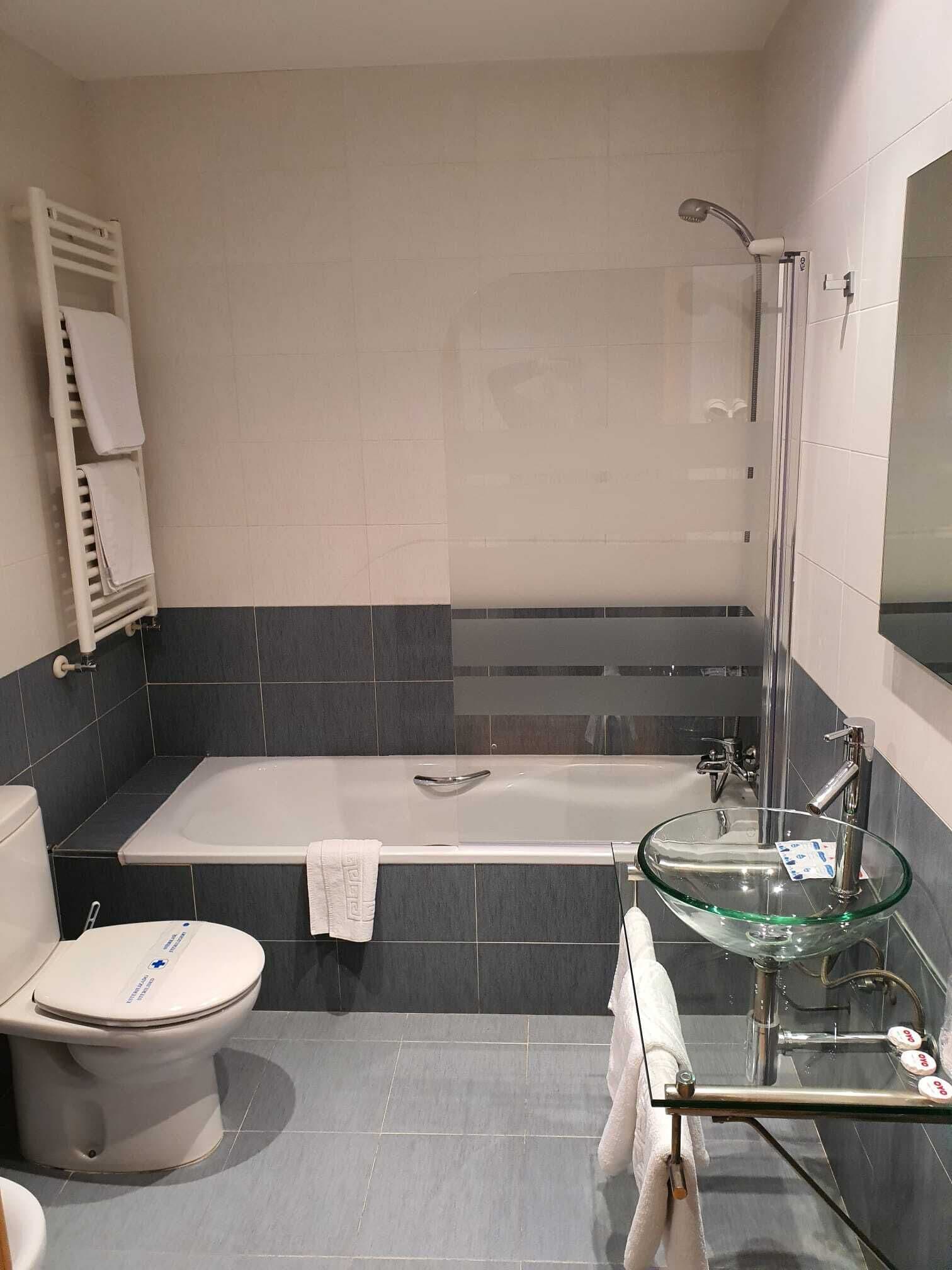 quadruple room | bathroom | shower, hair dryer, towels, soap