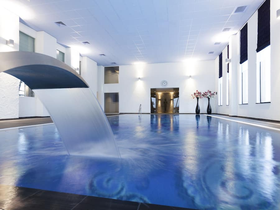 Indoor pool, open 7:00 AM to 11:00 PM, sun loungers