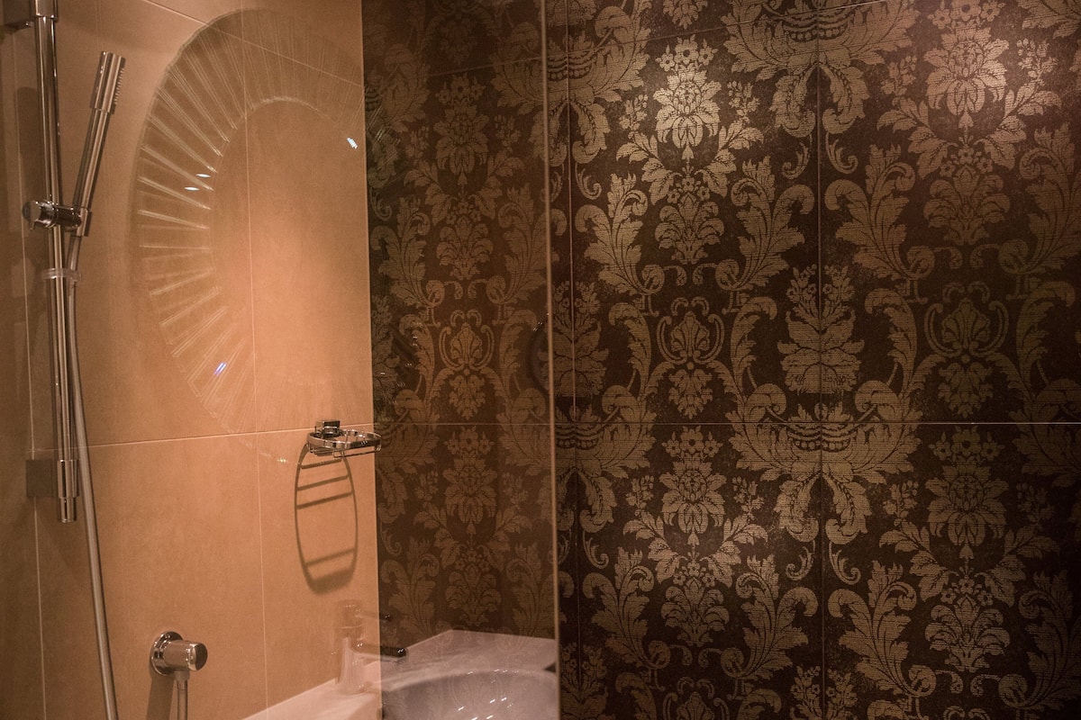 shower, free toiletries, hair dryer, bathrobes