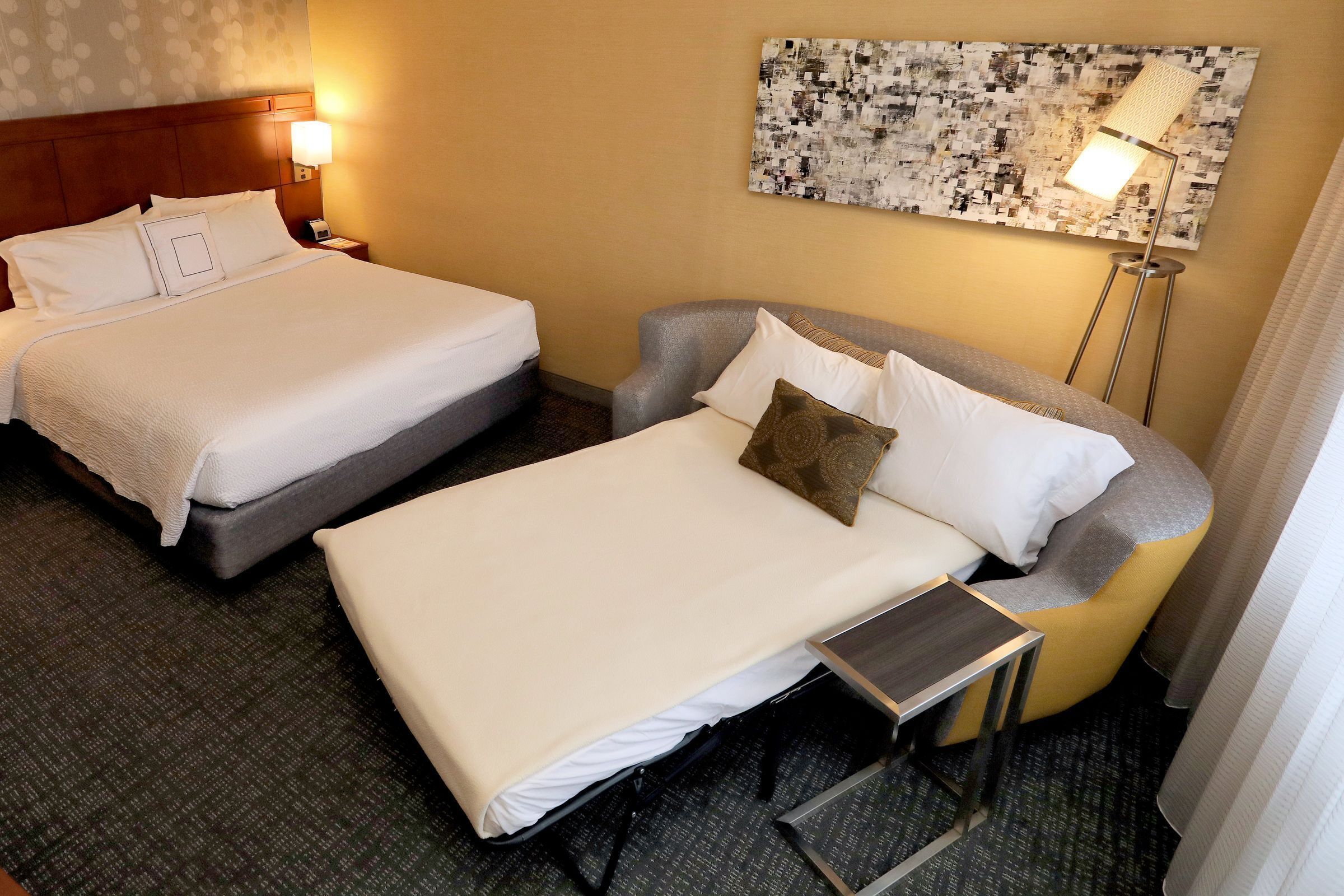 room, 1 king bed with sofa bed, city view | down duvets, desk, soundproofing, iron/ironing board