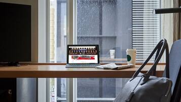 Premium bedding, down comforters, desk, blackout drapes